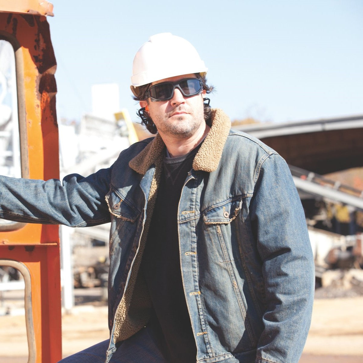 Pyramex SB7030SDT I-Force Safety Glasses/Goggles - Black Frame - Gray H2X Anti-Fog Lens worn by construction worker wearing a hard hat