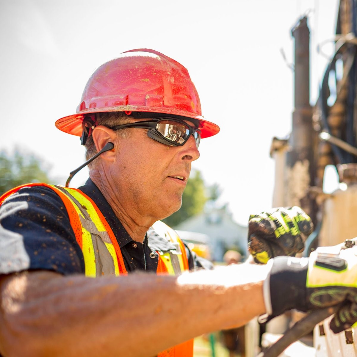 Pyramex SBG5080DT Highlander Plus Safety Glasses - Black Foam Lined Frame - Indoor/Outdoor Anti-Fog Mirror Lenses worn by worker