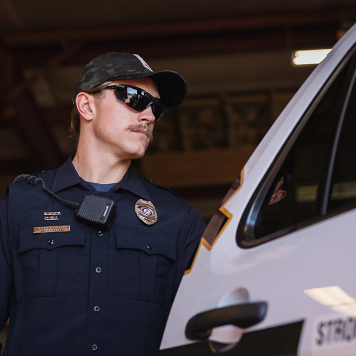 Worker wearing Bolle COMBKITN Combat Safety Glasses Three-Lens Kit