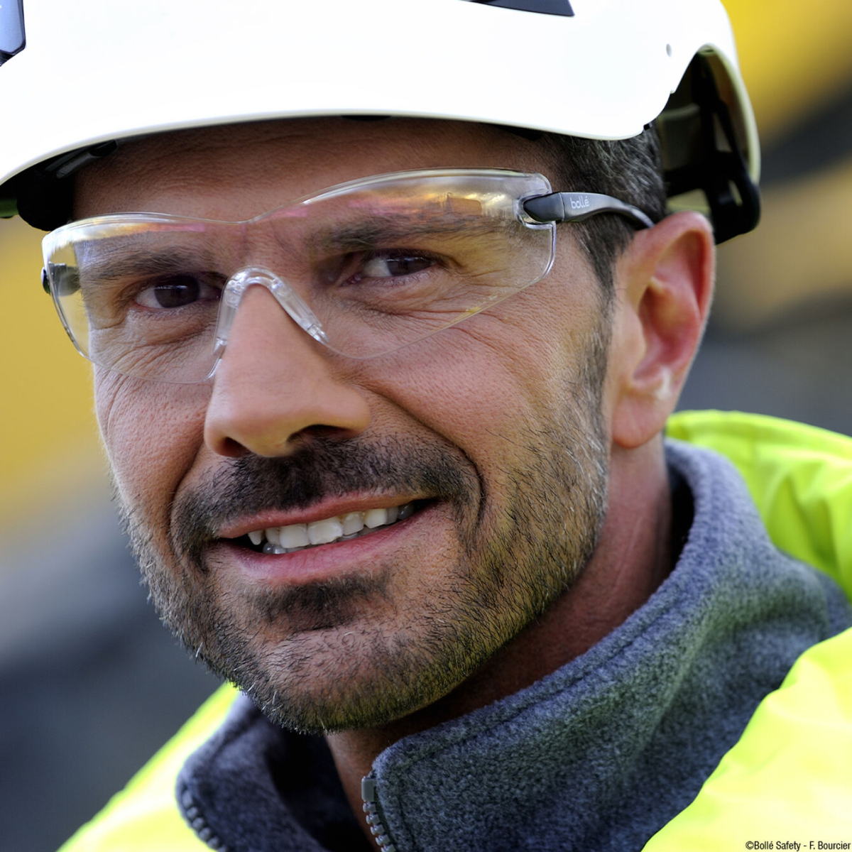 Worker wearing Bolle Cobra Safety Glasses with Clear Lens