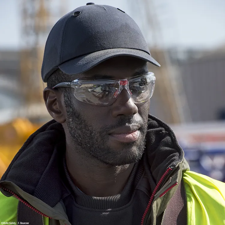 Worker wearing Bolle IRI-S Safety Glasses with Clear Lenses outdoors
