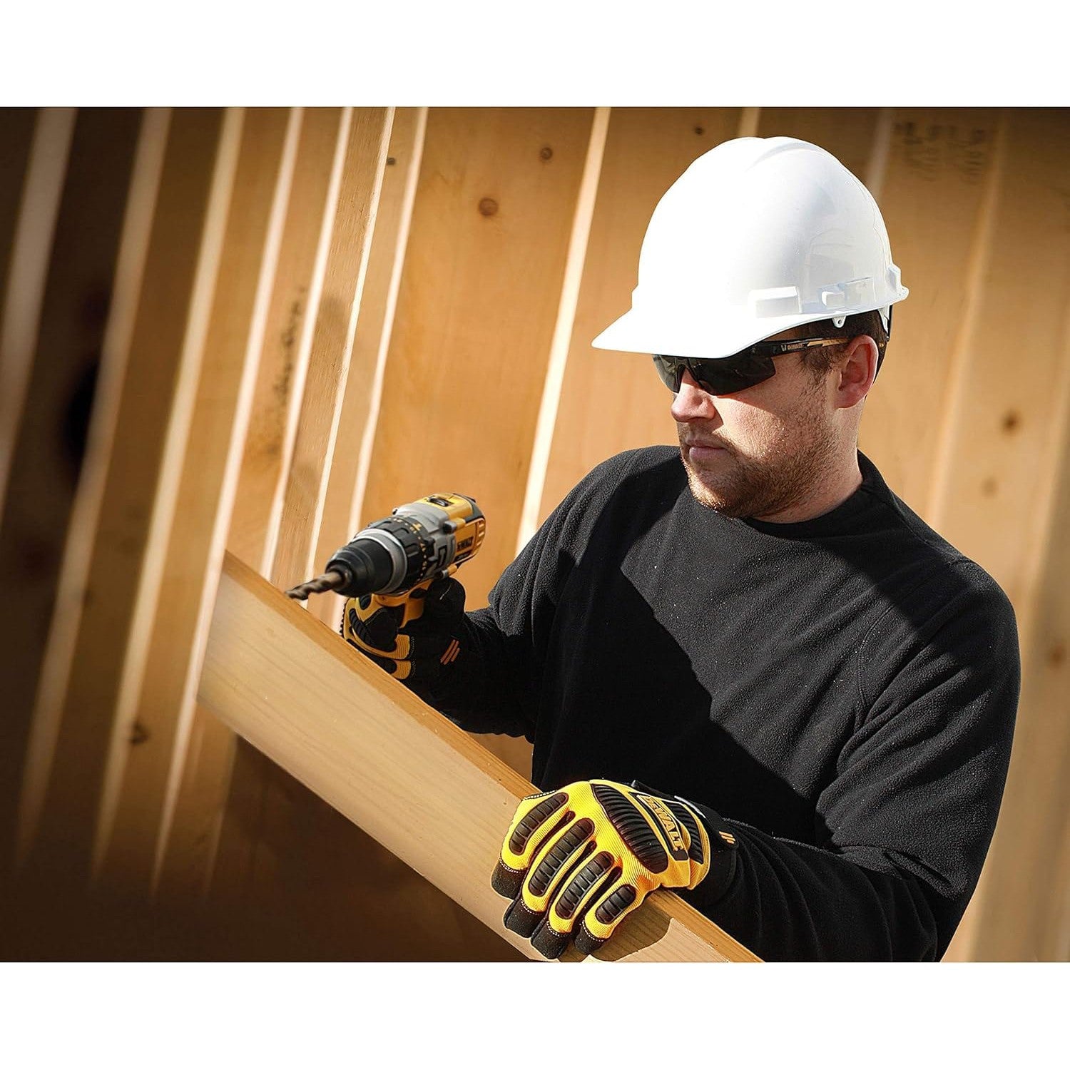Worker wearing DEWALT DPG99-2P HDP Safety Glasses Black Frame with Smoke Polarized Lenses