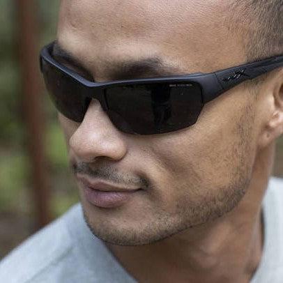 Wiley X Saint CHSAI08 Sunglasses with Matte Black Frame and Smoke Gray Lenses Worn in the field