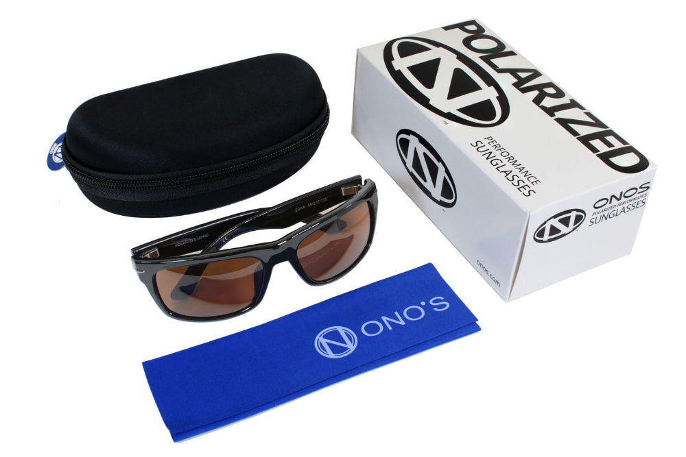 Ono's sunglasses with case and box on a white background
