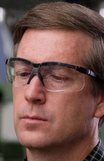 Uvex Genesis Bifocal Safety Glasses with Black Frame and Gray Ultra-Dura Lens - Man Wearing Uvex Genesis Readers